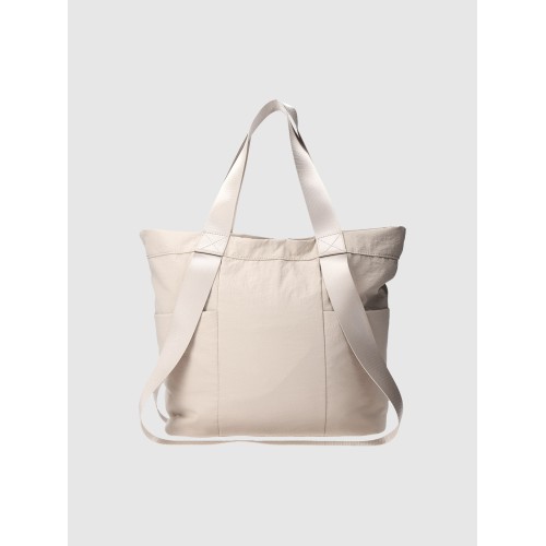 Beżowa Torba na ramię damska 4F – funkcjonalna, z hydrofobową impregnacją i licznymi kieszeniami, idealna na trening i co dzień